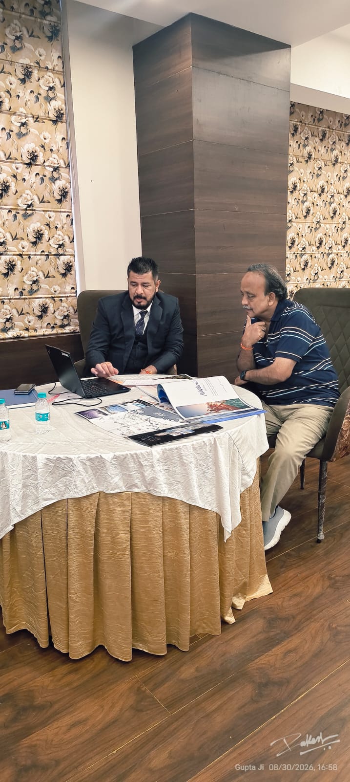 DAMAC associate meeting a client at the expo